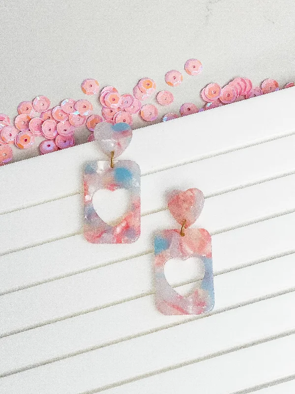 Elevate Your Outfit With Discounted Statement Jewelry Blush Marbled Heart Cutout Dangles